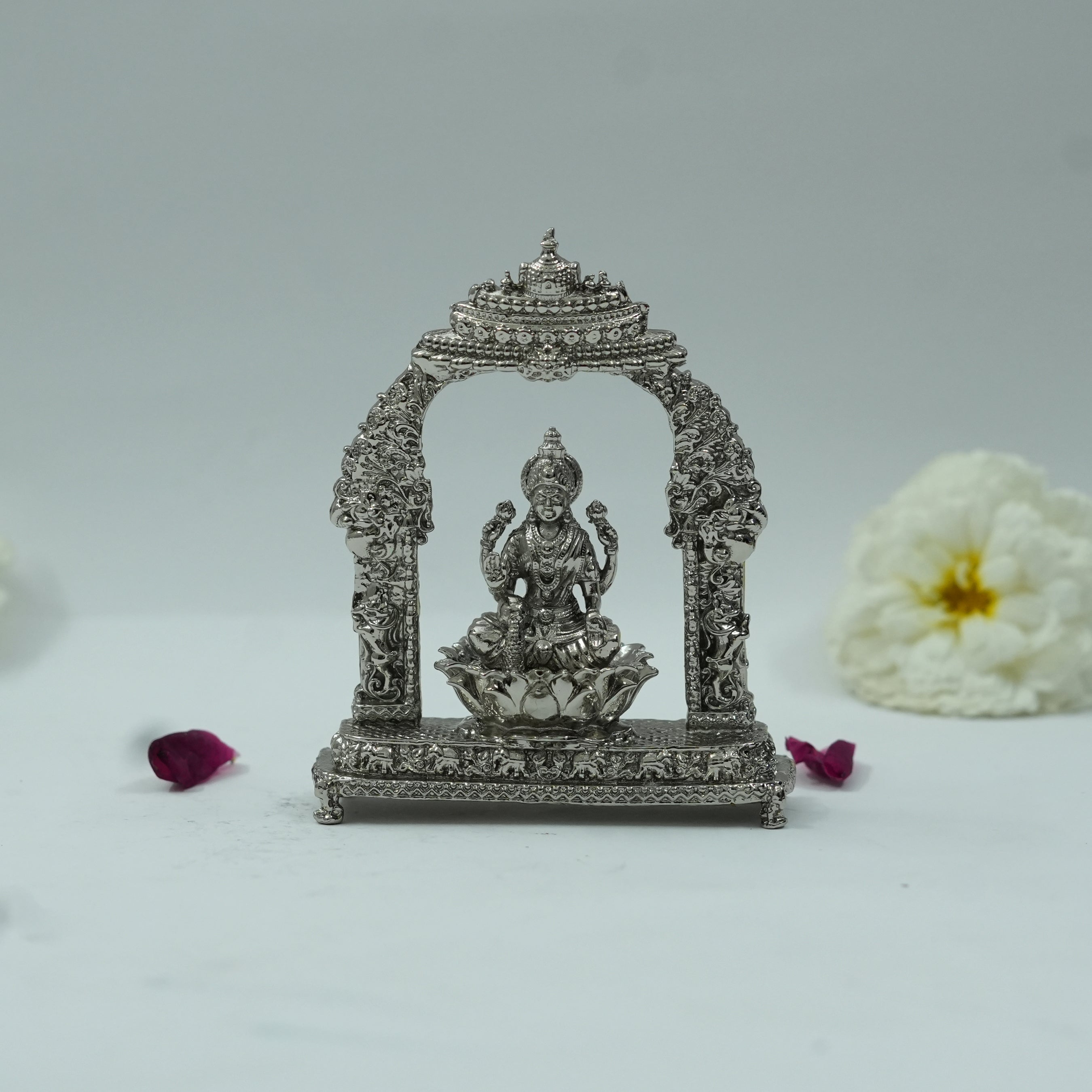 Divine Goddess Lakshmi Idol with Ornate Arch – Handcrafted Pooja Murti for Home & Temple